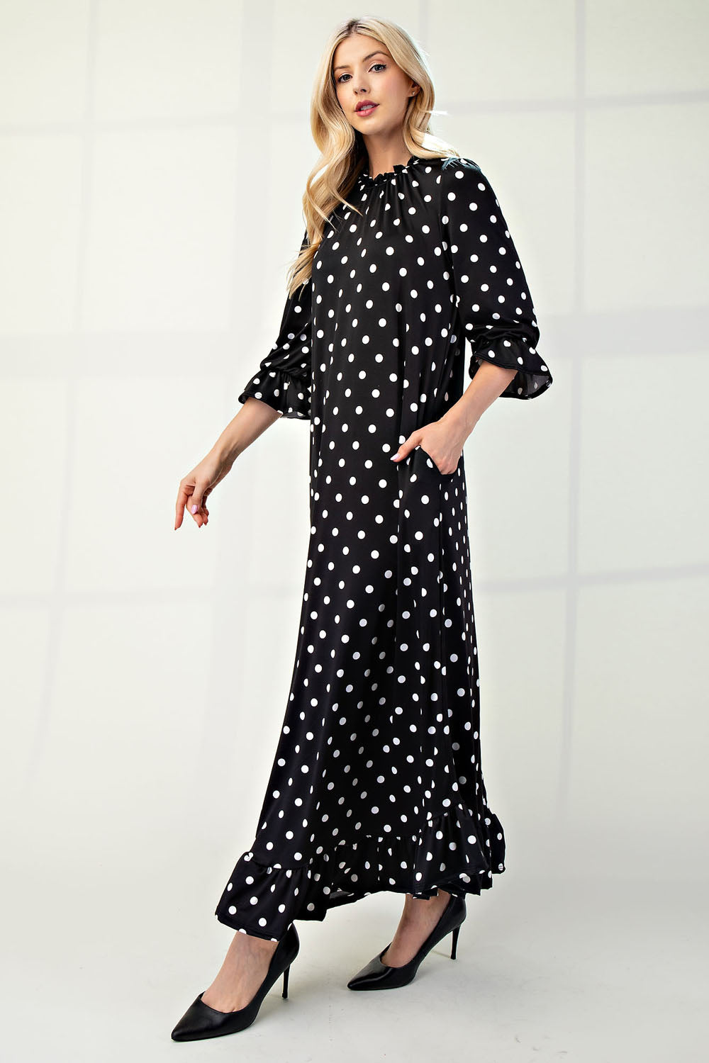 Polka dot 3/4 sleeve ruffle trim dress by ModestAndDevoted, stylish missy size, perfect for casual or semi-formal occasions.