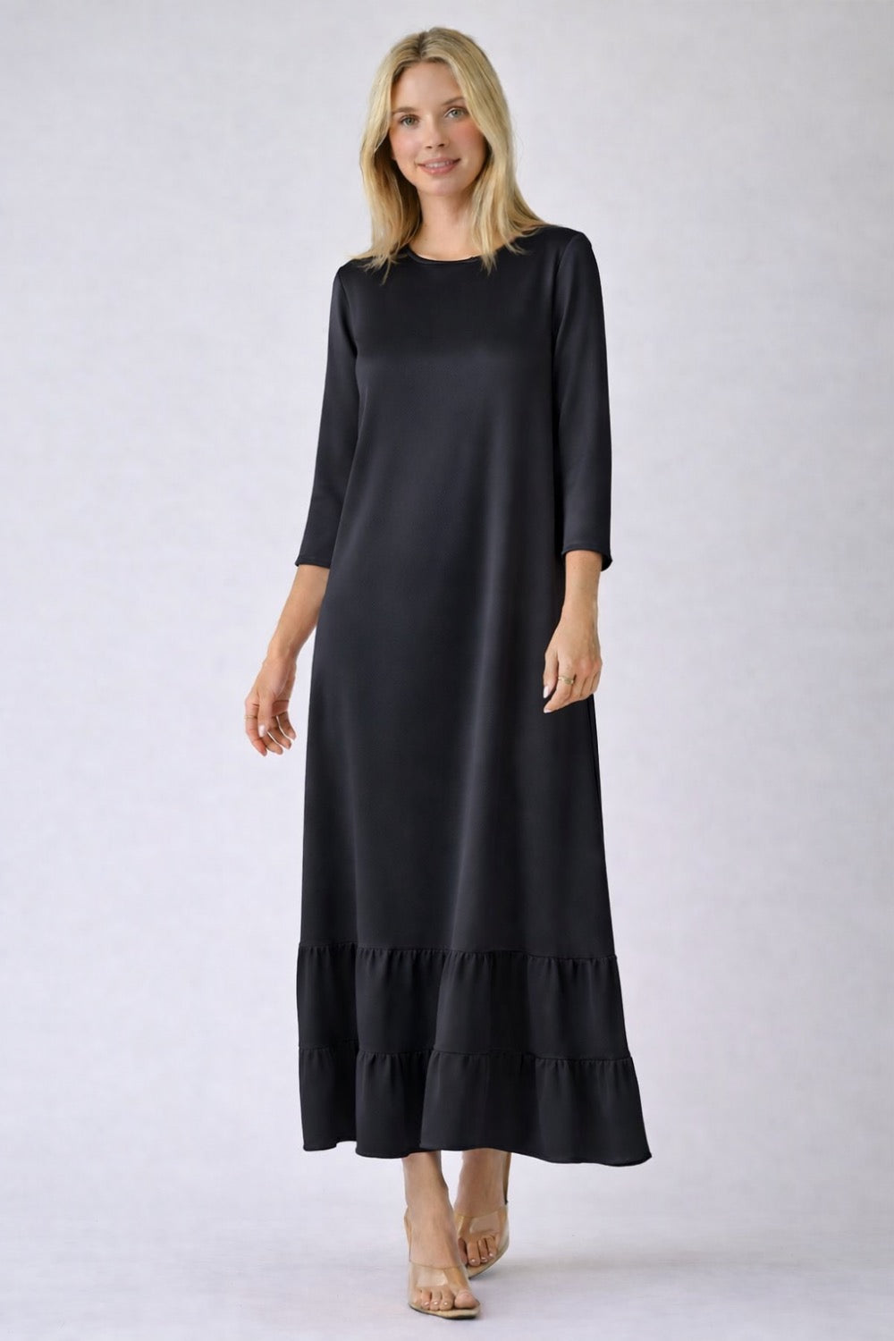 White women's modest maxi dress by ModestAndDevoted featuring a flowing, elegant design for a sophisticated and modest look.