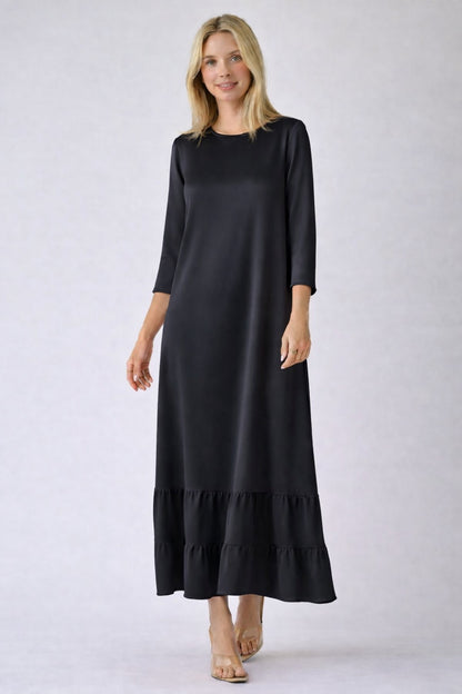 White women's modest maxi dress by ModestAndDevoted, featuring an elegant, flowing design perfect for everyday or special occasions.