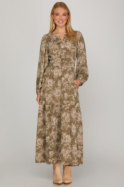 Olive long sleeve woven scroll print tiered maxi dress by ModestAndDevoted, featuring a flowing design and intricate pattern.