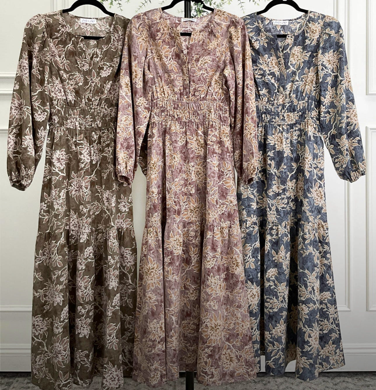 Long sleeve woven scroll print tiered maxi dress in mocha mauve by ModestAndDevoted, featuring a flowing silhouette and elegant design.