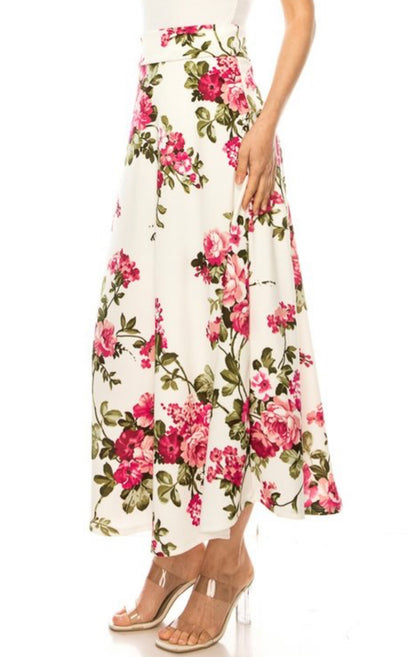 Dressy floral print maxi A-line skirt by ModestAndDevoted, featuring a flowy design and vibrant floral pattern.