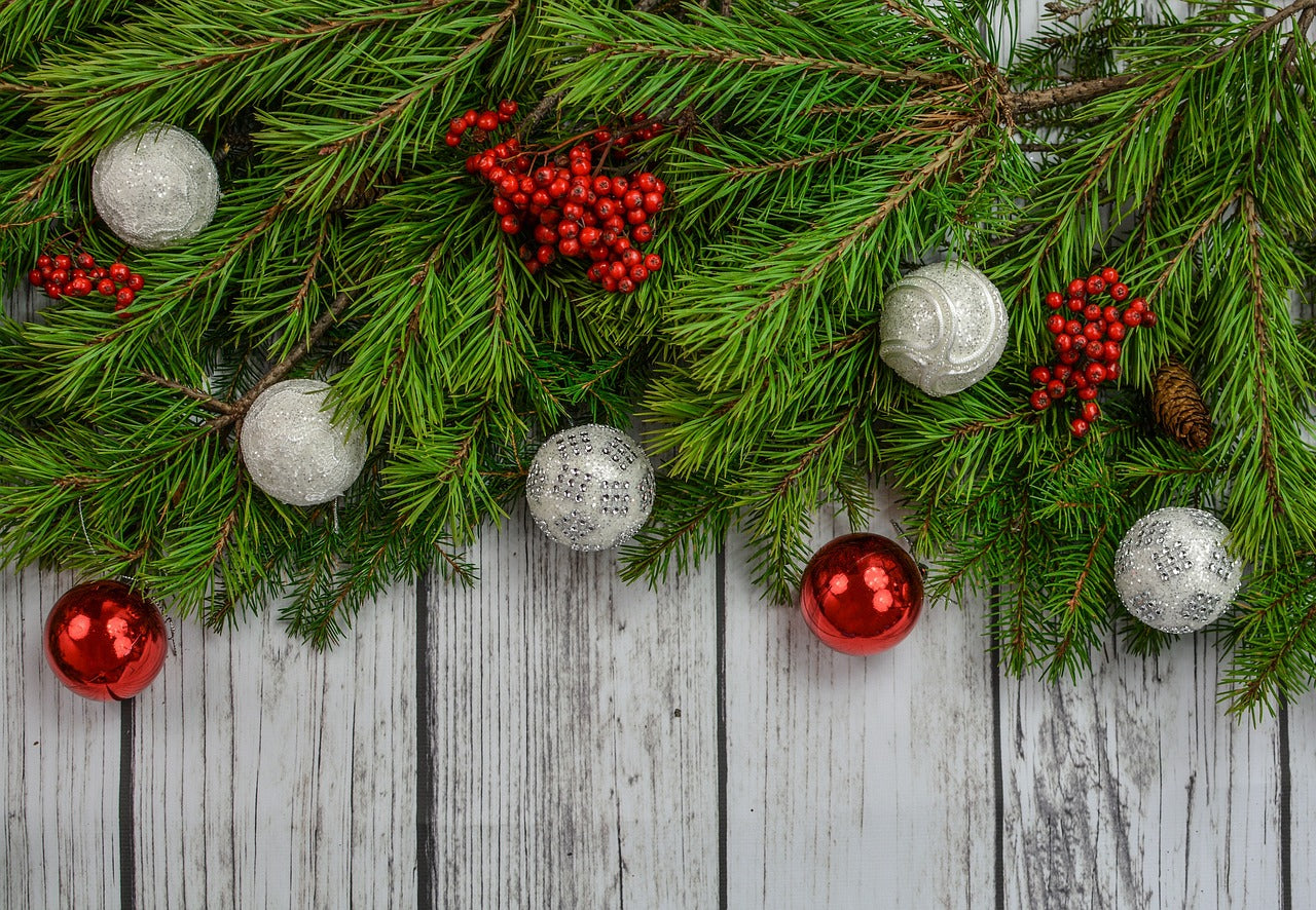 ModestAndDevoted Merry Christmas gift card featuring festive garland and holiday design on a white background.