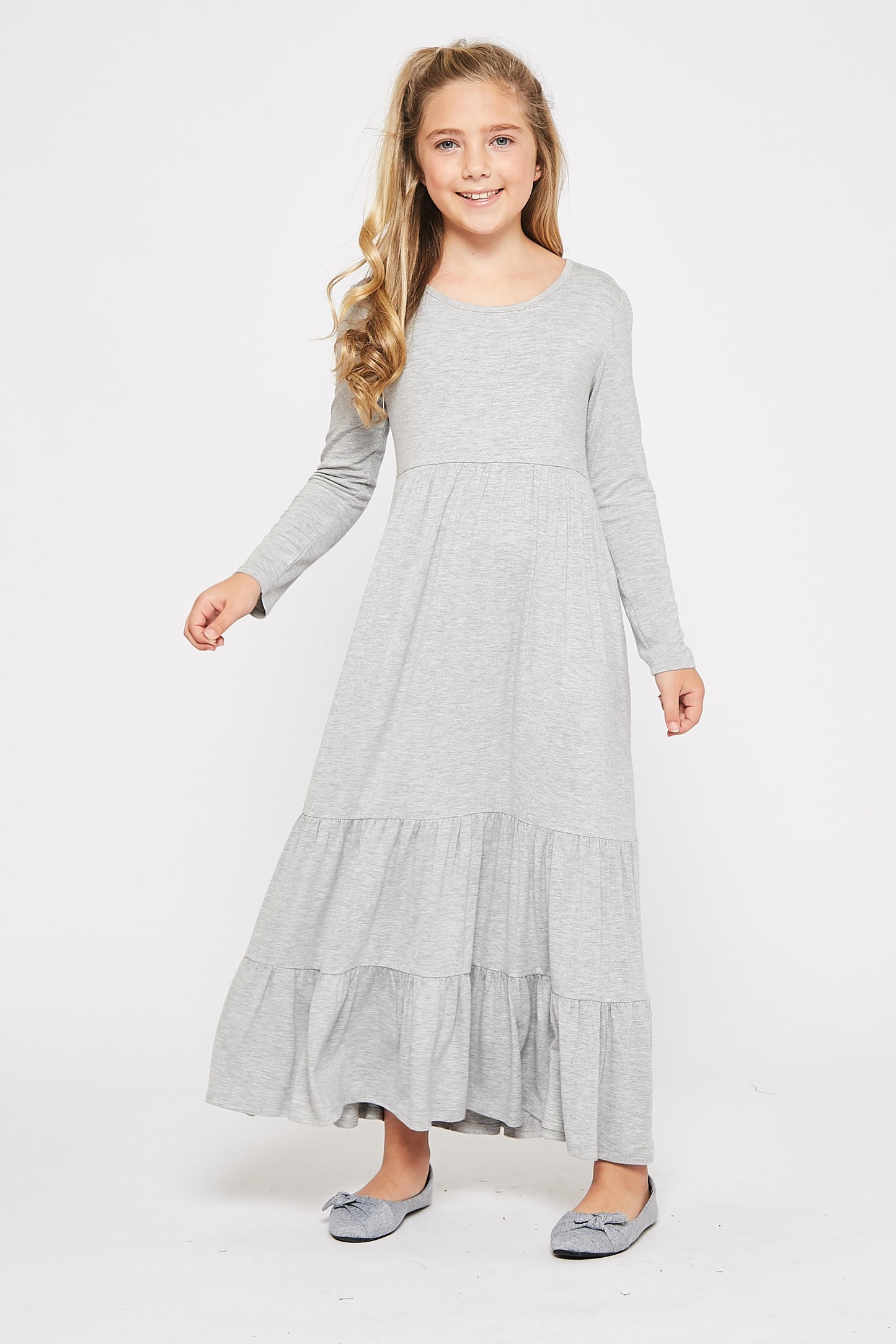 Green girls' solid tiered maxi dress by ModestAndDevoted, featuring a flowing, layered design for girls' special occasions.
