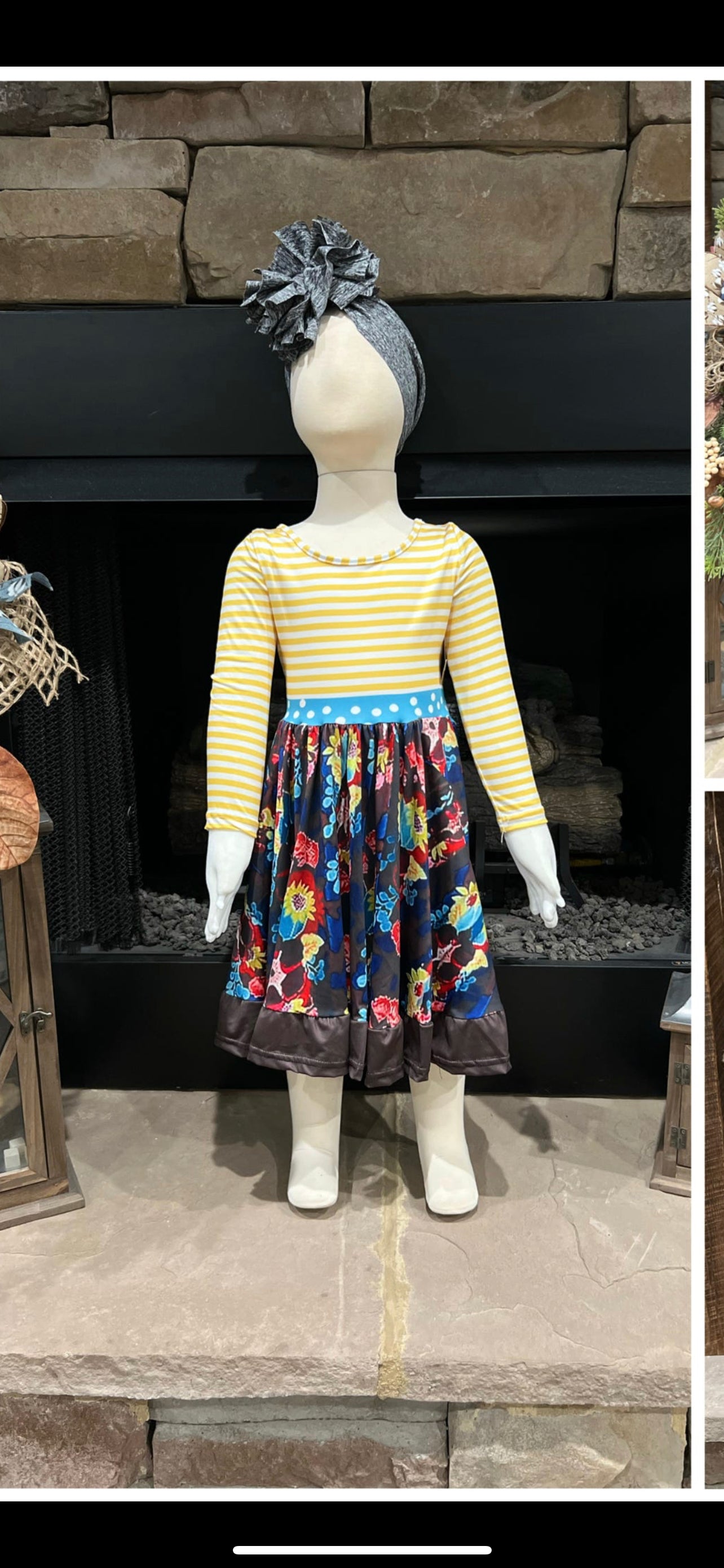 Girls tunic dress by ModestAndDevoted featuring brown and yellow stripes with floral patterns, perfect for casual wear.