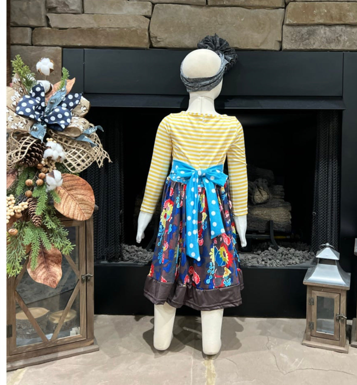 Girls tunic dress by ModestAndDevoted featuring brown and yellow striped and floral patterns, perfect for casual wear.