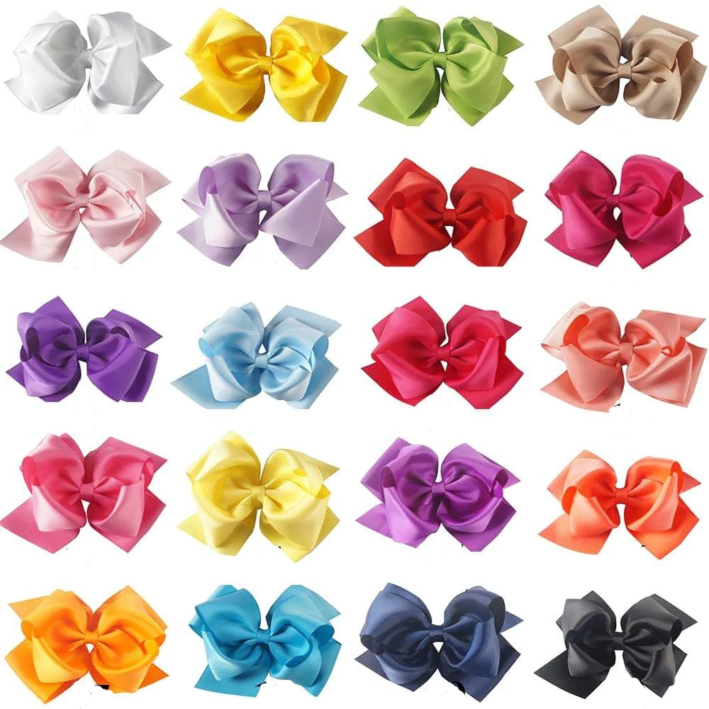 Six-inch ModestAndDevoted jumbo boutique double hairbow with large, layered fabric bows for a stylish hair accessory.