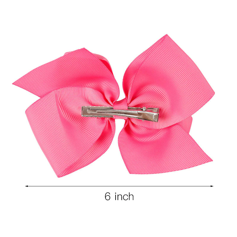 Large 6-inch boutique double hairbow by ModestAndDevoted, featuring soft fabric and stylish design for girls' hair accessories.