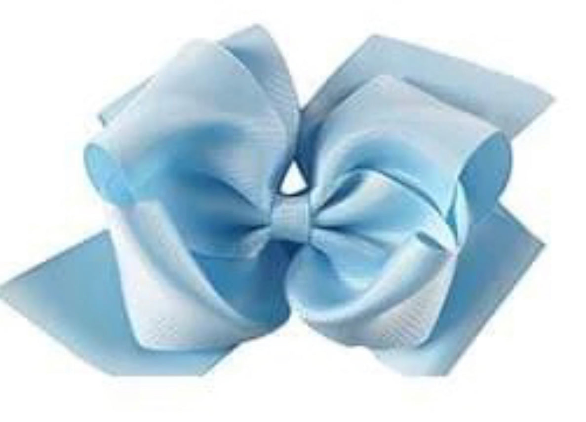 Six-inch boutique double hairbow by ModestAndDevoted, jumbo hair accessory with layered fabric bows for girls' hairstyles.
