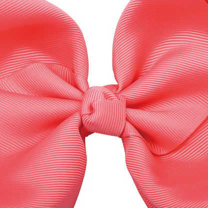 Large 8-inch boutique jumbo hairbow by ModestAndDevoted, featuring soft fabric and elegant design perfect for special hairstyles.
