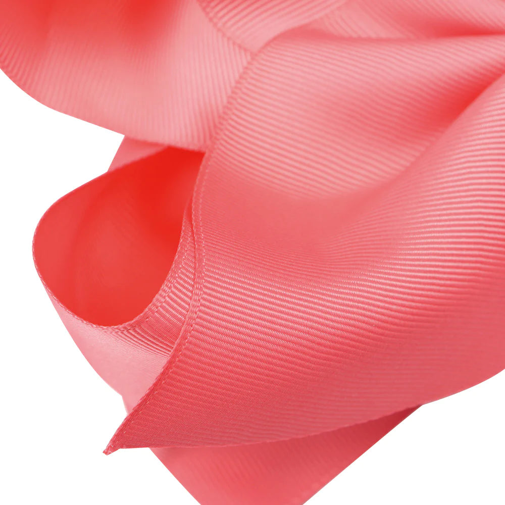 Large 8-inch boutique jumbo hairbow by ModestAndDevoted with soft fabric and stylish design, perfect for hair accessories.