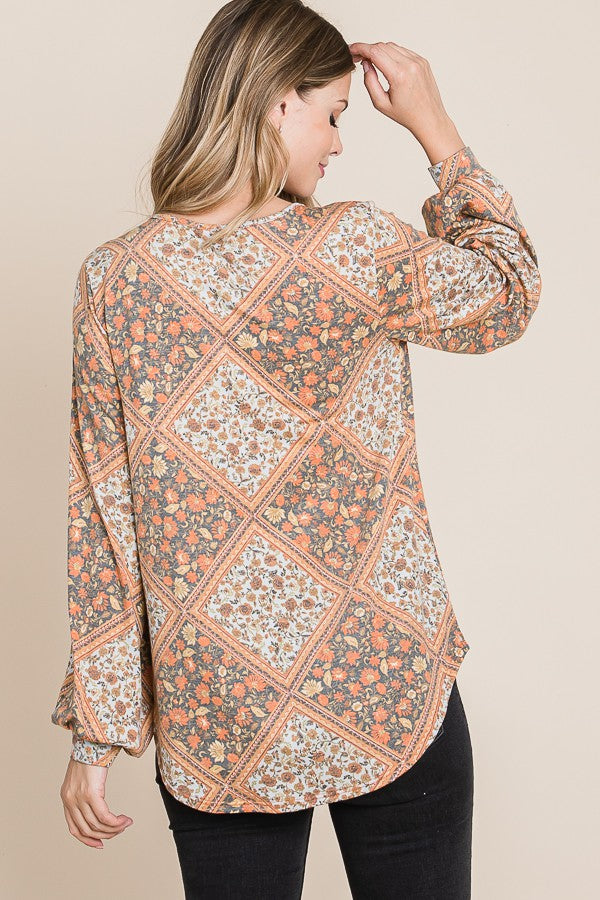 ModestAndDevoted Bombom long sleeve Jacquard boho top in rust and cream, featuring intricate woven pattern and relaxed fit.