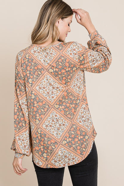 ModestAndDevoted Bombom long sleeve Jacquard boho top in rust and cream, featuring intricate woven pattern and relaxed fit.