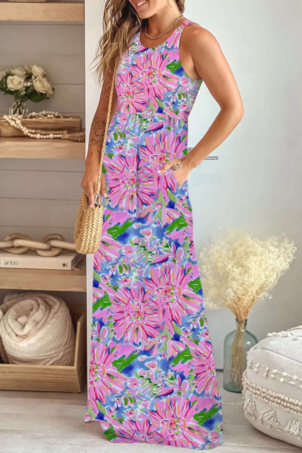 Multicolor summer floral sleeveless maxi dress with pockets by ModestAndDevoted, flowing fabric and vibrant floral pattern.