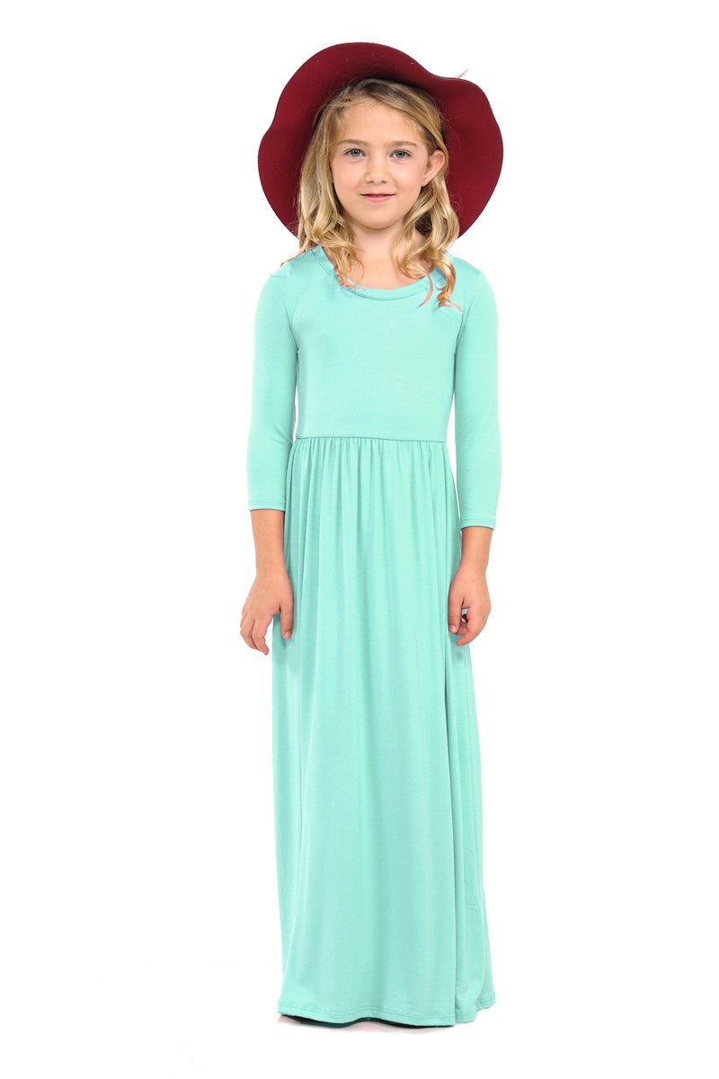 Girls solid peach maxi dress by ModestAndDevoted, featuring a comfortable, flowing design and sleeveless style.