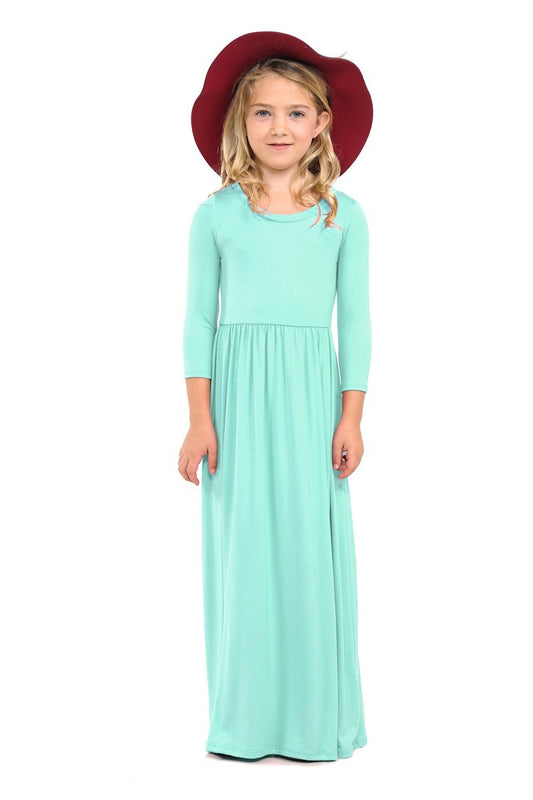Girls solid peach maxi dress by ModestAndDevoted, featuring a comfortable, flowing design and sleeveless style.