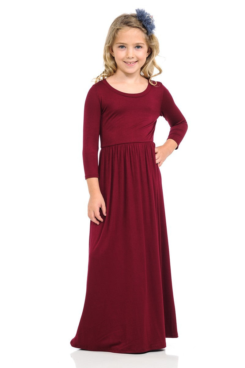 Girls solid peach maxi dress by ModestAndDevoted, flowing style, sleeveless design, perfect for warm-weather occasions.