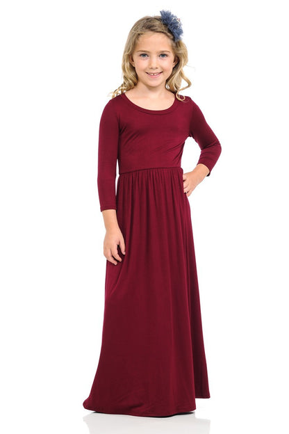 Girls solid peach maxi dress by ModestAndDevoted, flowing style, sleeveless design, perfect for warm-weather occasions.