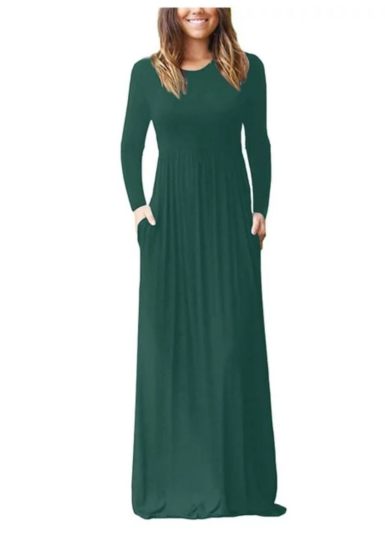 Deep red women's long sleeve maxi dress by ModestAndDevoted with pockets, flowing fabric, and elegant style.