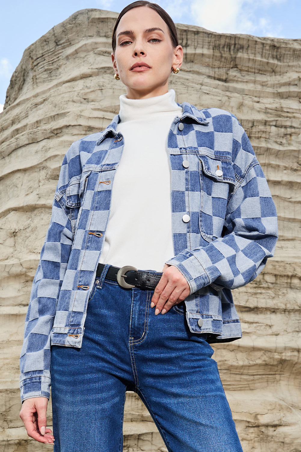 Light blue checkered patchwork denim jacket by ModestAndDevoted featuring button-up front and classic outerwear style.