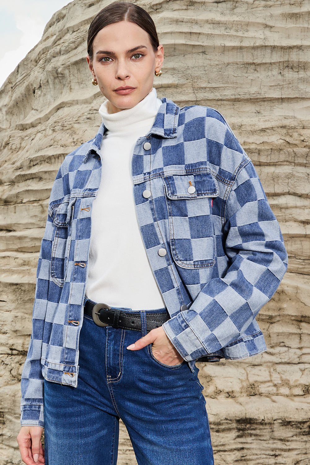Light blue checkered patchwork denim jacket by ModestAndDevoted, featuring button-up front and classic outerwear style.