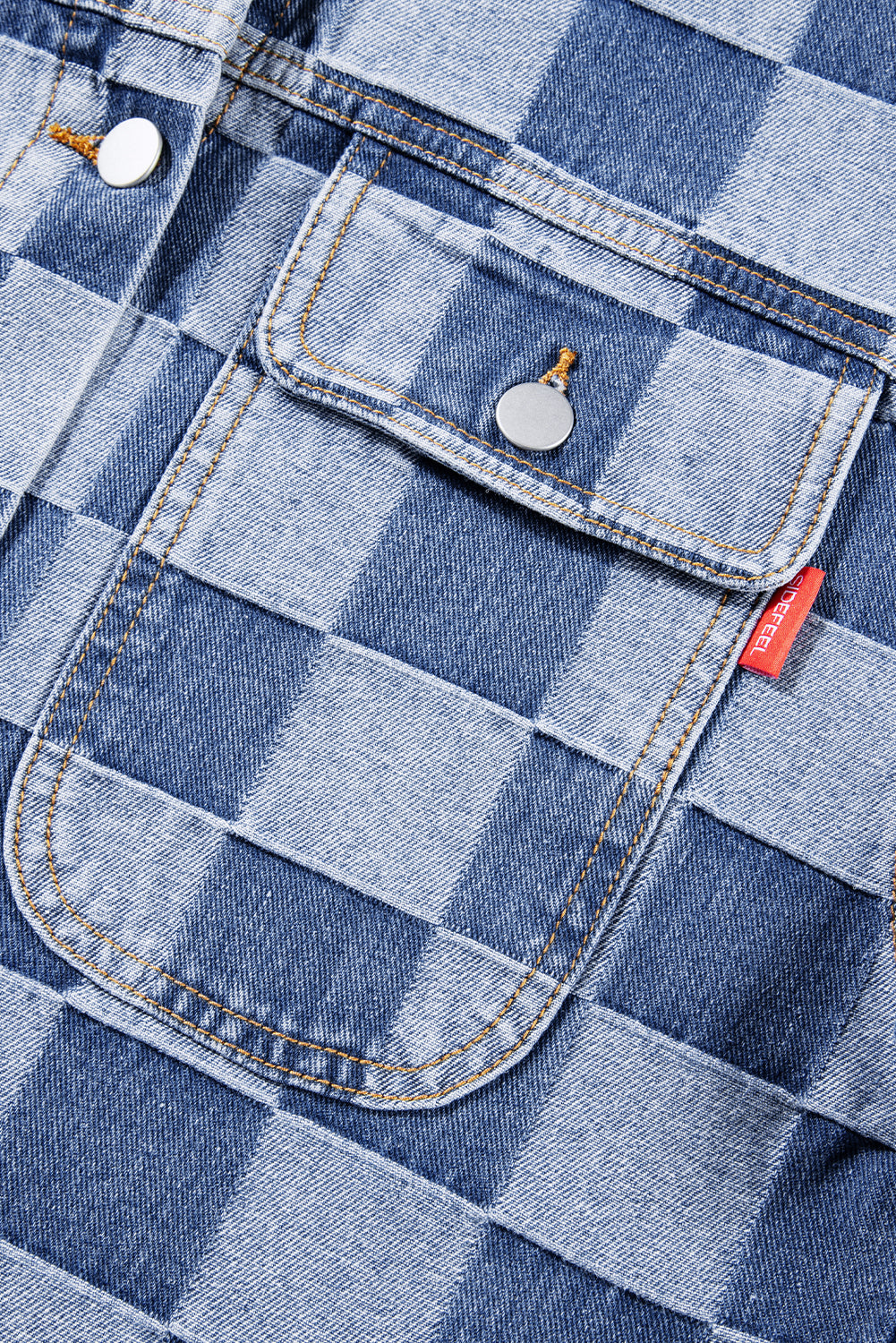 Light blue checkered patchwork denim jacket by ModestAndDevoted, button-up outerwear with cotton-polyester blend and stylish design.