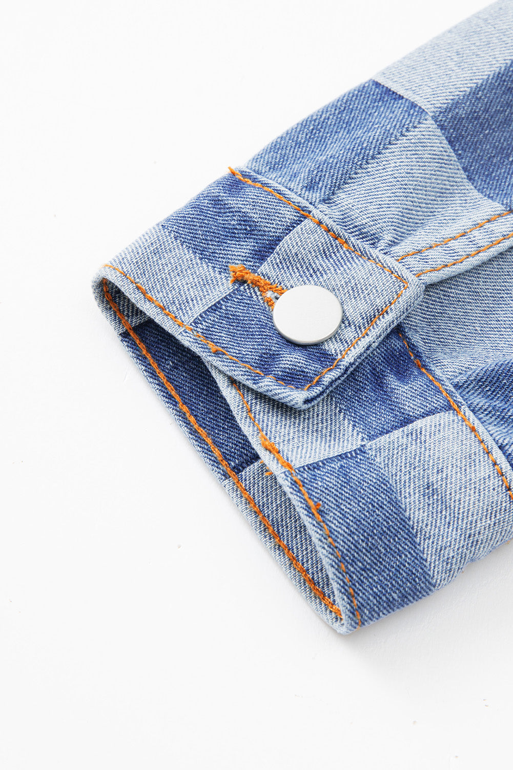 Light blue checkered patchwork denim jacket from ModestAndDevoted, button-up outerwear with cotton-polyester blend fabric.
