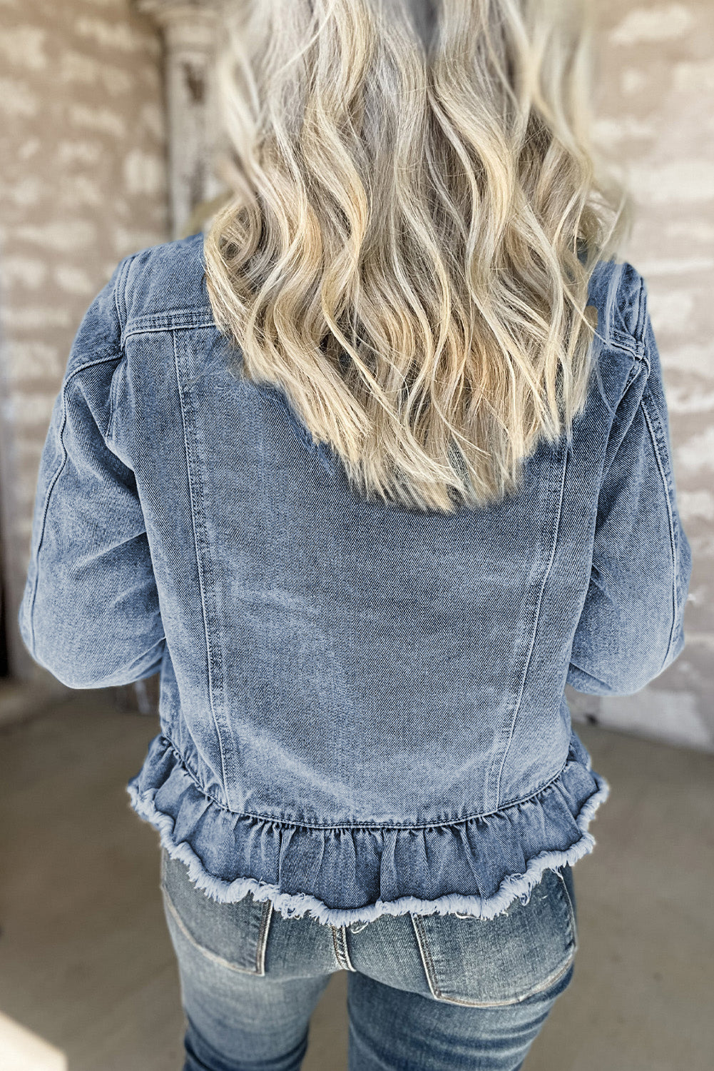 Beau Blue Ruffle Raw Hem Denim Jacket with flap pockets, ModestAndDevoted outerwear, casual stylish women’s jacket on white background.