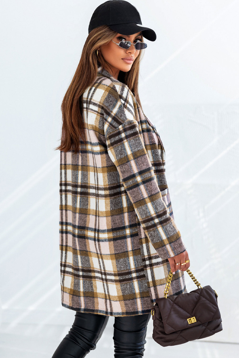 Pink plaid button-up lapel jacket from ModestAndDevoted, stylish outerwear with classic plaid pattern and tailored fit.