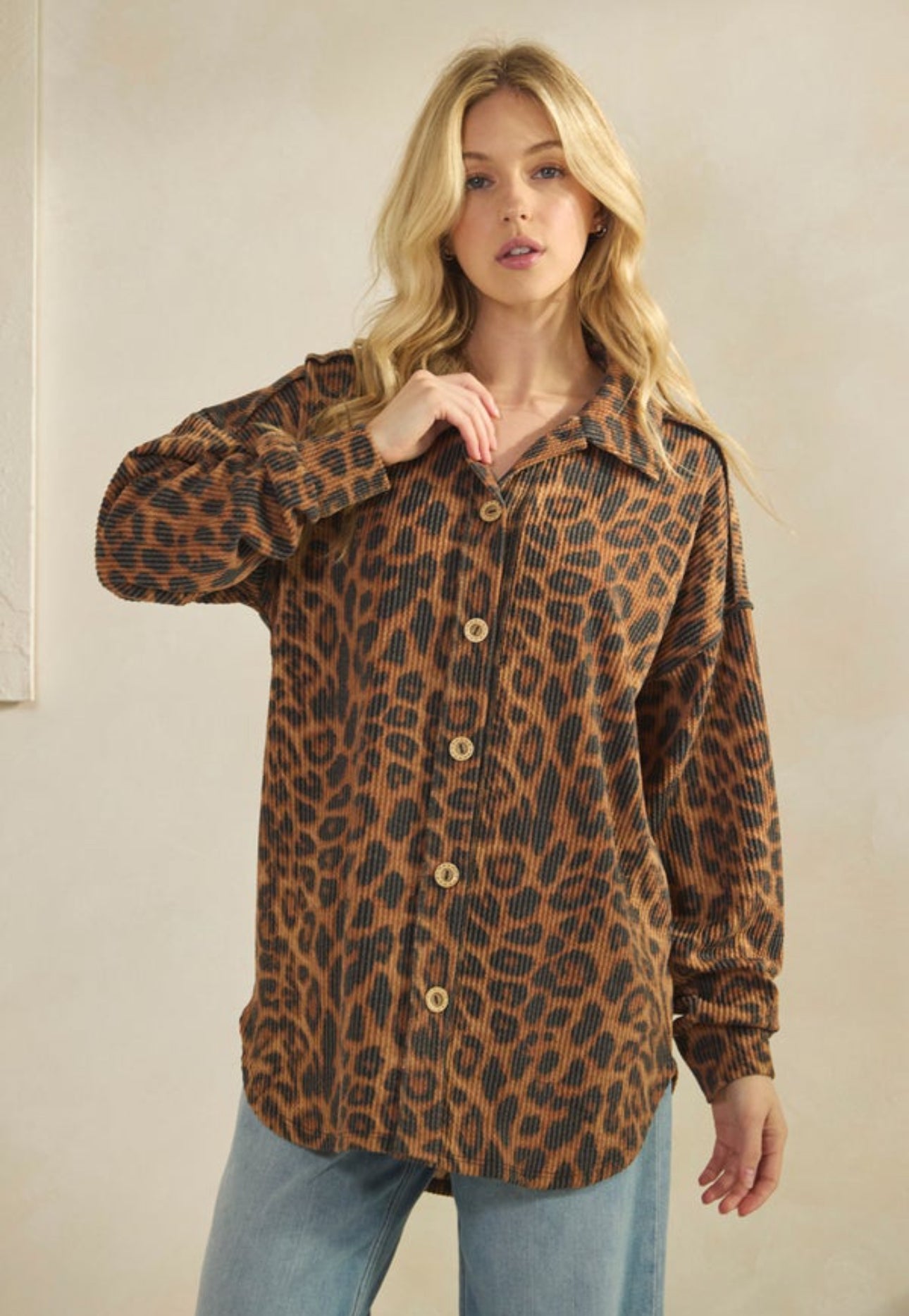 Pink tweed oversized button-down shacket by ModestAndDevoted, featuring a classic textured fabric and relaxed fit.