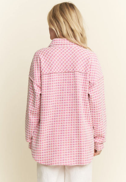 Pink tweed oversized button-down shacket by ModestAndDevoted, featuring assorted buttons and a relaxed fit.