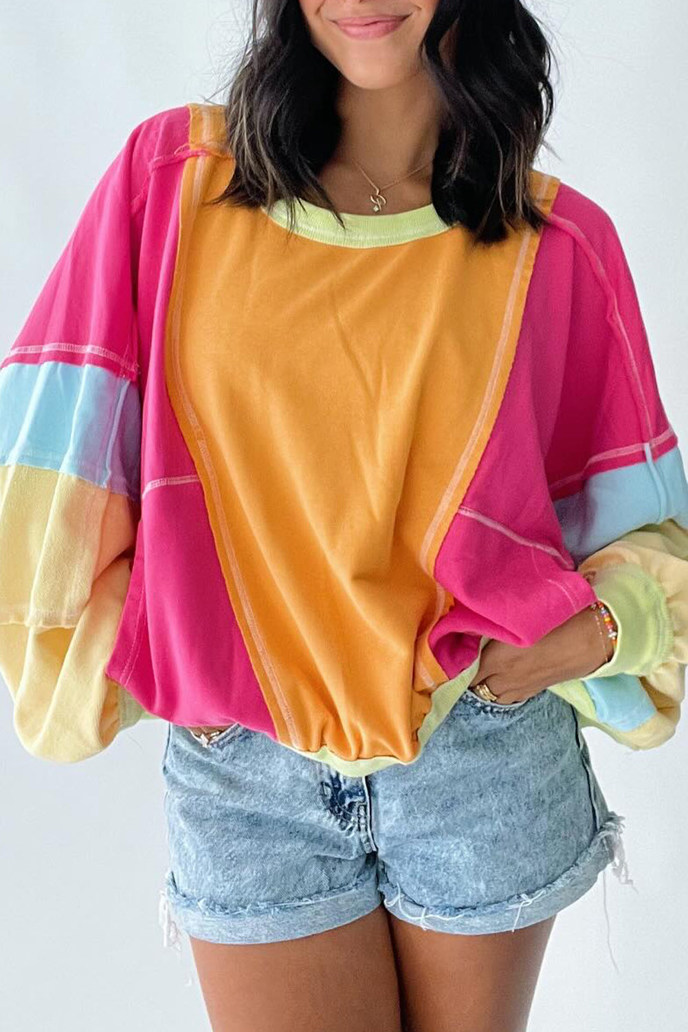Plus size Rose Red colorblock patchwork sweatshirt with exposed seams from ModestAndDevoted, made of polyester and cotton.