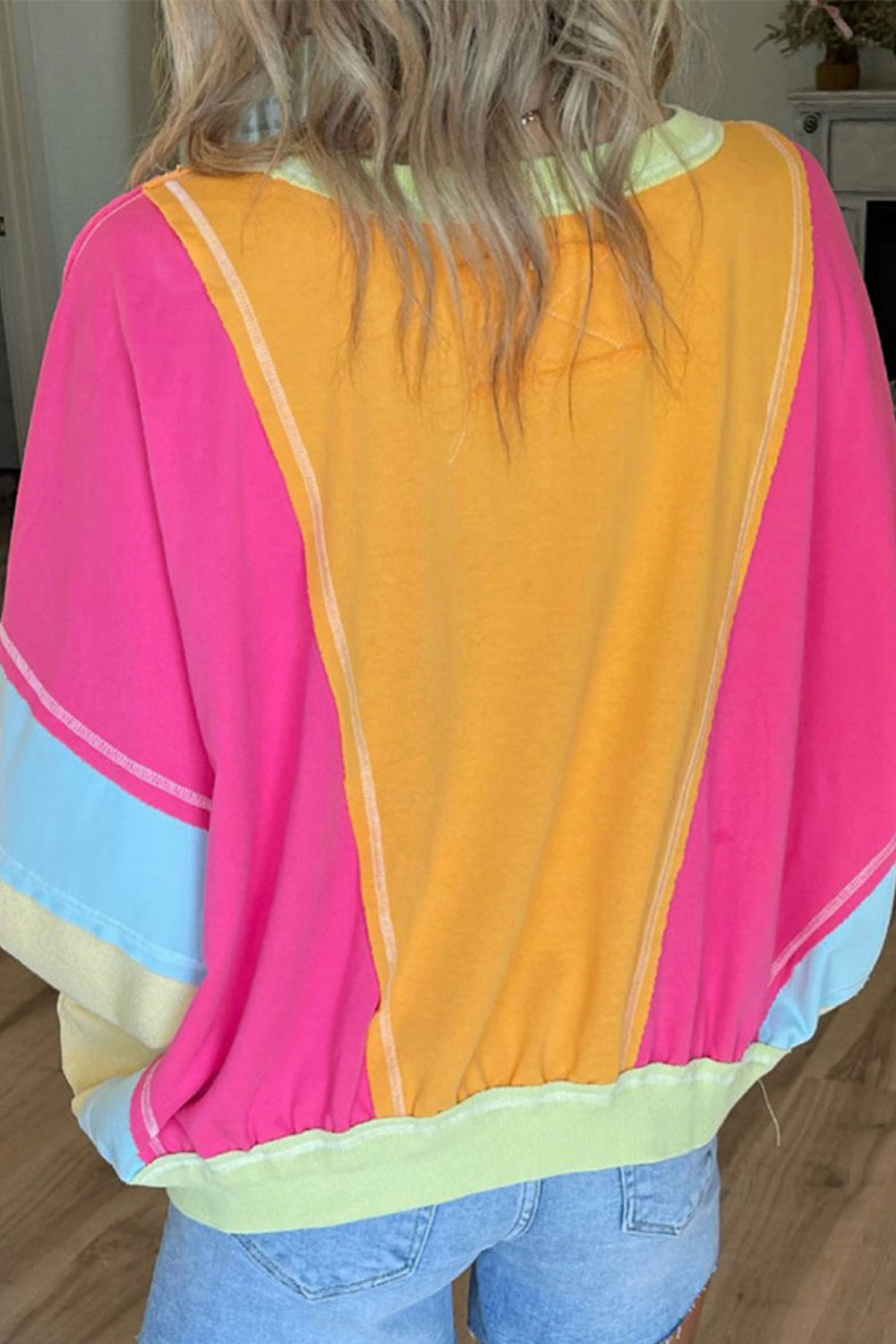 Rose red plus size colorblock patchwork sweatshirt with exposed seams, made of polyester and cotton, by ModestAndDevoted.