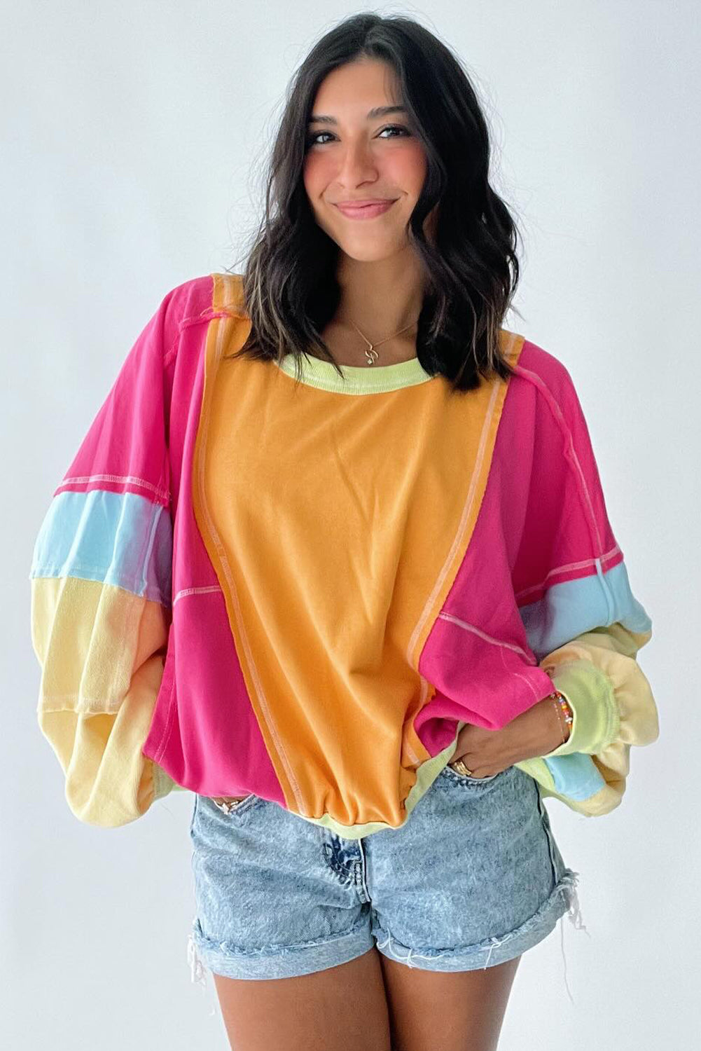 Rose red plus size colorblock patchwork sweatshirt with exposed seams, made of polyester and cotton, by ModestAndDevoted.