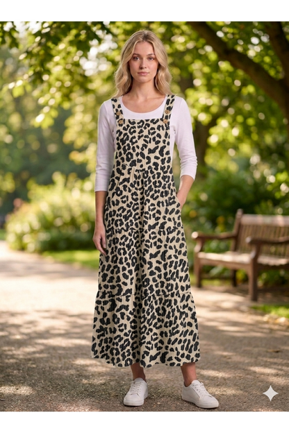 Women's animal print overall maxi dress by ModestAndDevoted, featuring a flowing silhouette and stylish animal pattern.