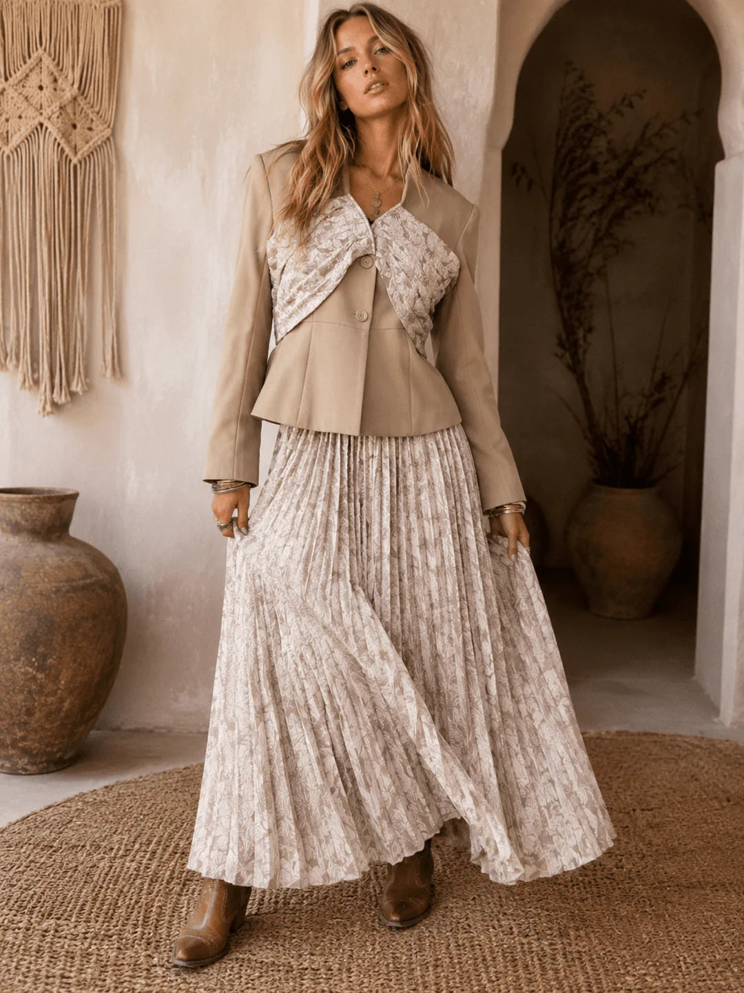 Women’s long sleeve blazer and elastic waist floral pleated maxi skirt set by ModestAndDevoted, styled together in a coordinated look.
