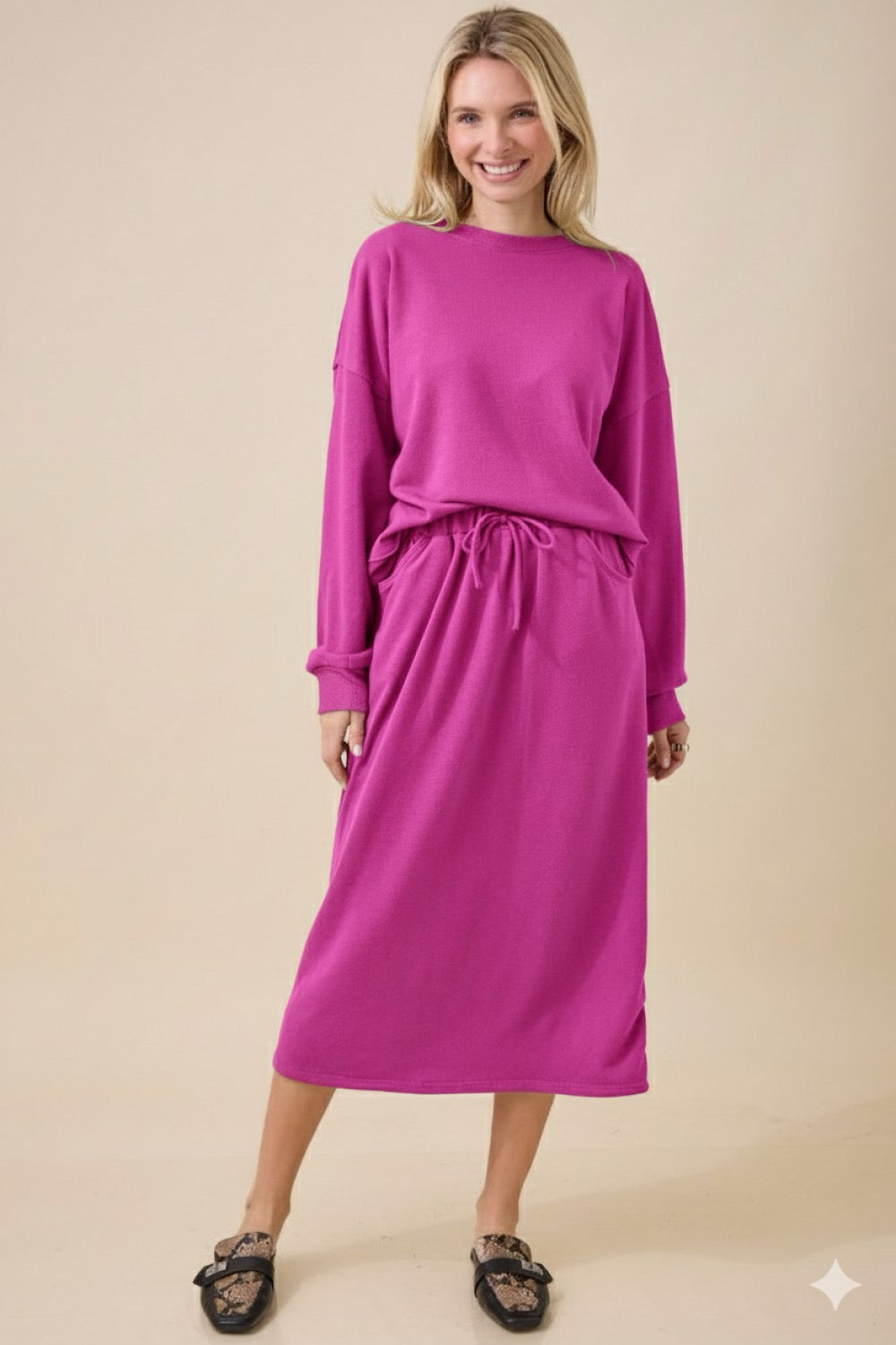 Fuchsia skirt set with pockets by ModestAndDevoted, featuring a comfortable and stylish two-piece ensemble with a matching top and skirt.