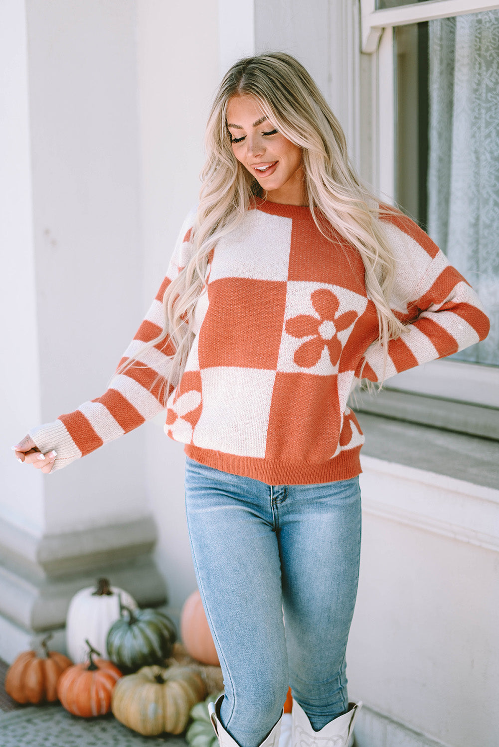 Brown checkered floral print sweater with striped sleeves from ModestAndDevoted, made of polyester, featuring a cozy, stylish design.