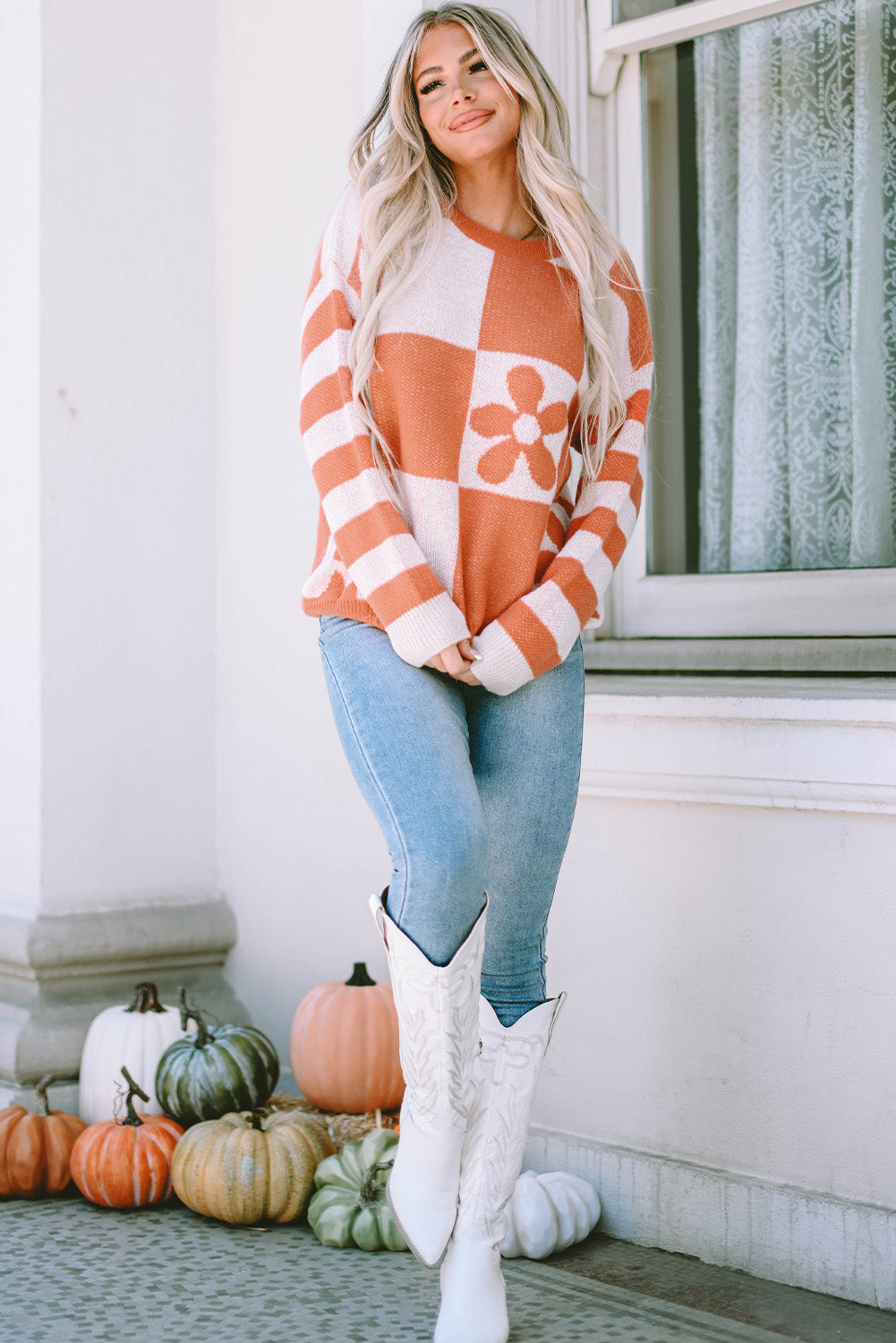 Brown checkered floral print sweater with striped sleeves from ModestAndDevoted, made of 100% polyester, featuring a cozy, stylish design.