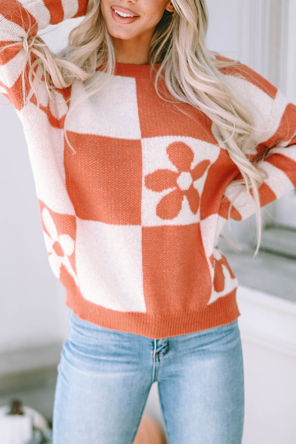 Brown checkered floral print sweater with striped sleeves from ModestAndDevoted, made of polyester, featuring a cozy, stylish design.