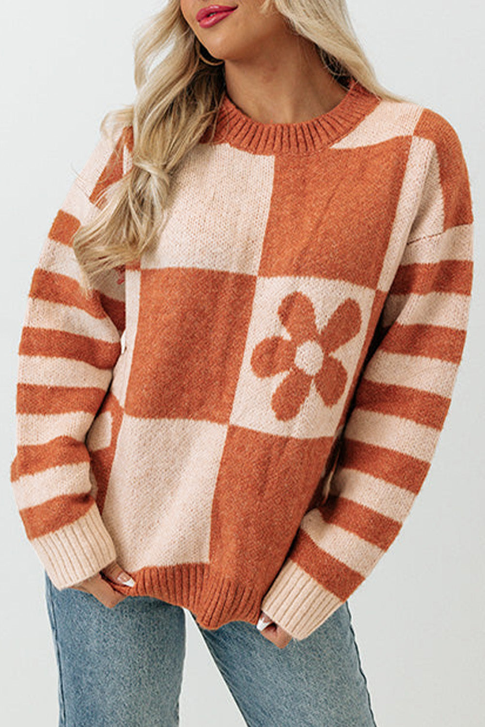 Brown checkered floral print sweater with striped sleeves by ModestAndDevoted, featuring a cozy polyester knit design.