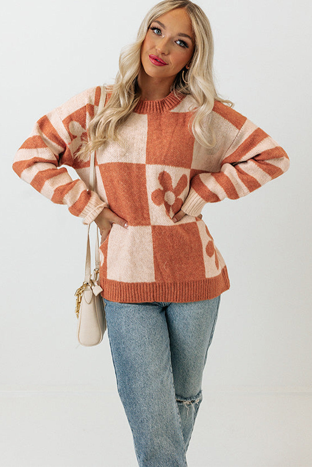 Brown checkered floral print sweater with striped sleeves from ModestAndDevoted, featuring a cozy polyester knit design.