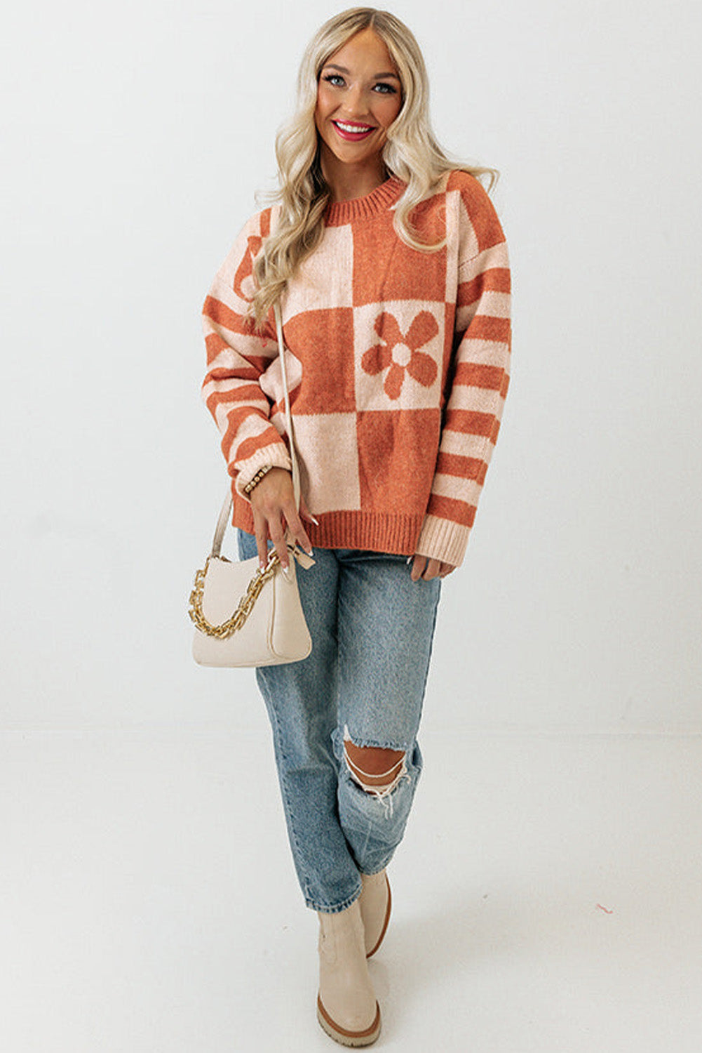 Brown checkered floral print striped sleeve sweater from ModestAndDevoted, featuring a cozy polyester knit and stylish design.