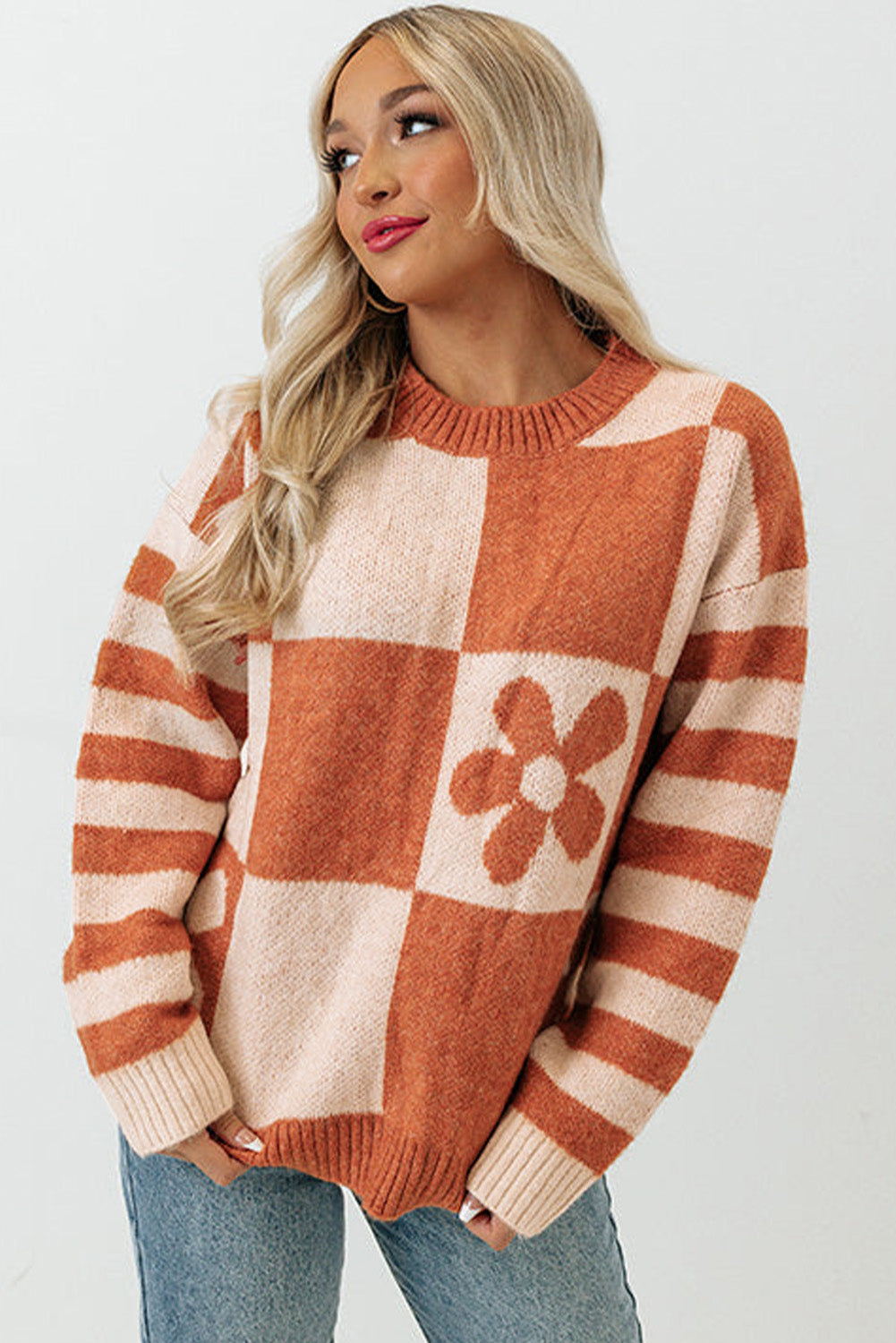 Brown checkered floral print sweater with striped sleeves from ModestAndDevoted, made of polyester, featuring a cozy, casual style.