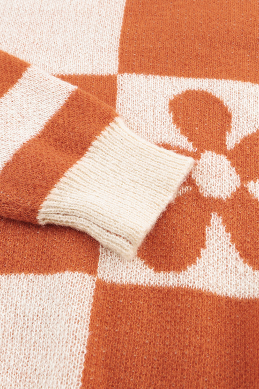 Brown checkered floral print sweater with striped sleeves from ModestAndDevoted, featuring a cozy polyester knit design.