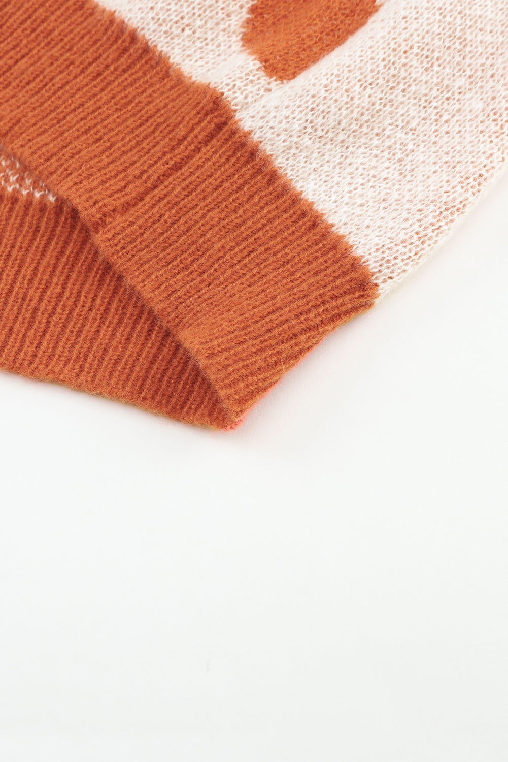 Brown checkered floral print sweater with striped sleeves from ModestAndDevoted, made of lightweight polyester fabric.