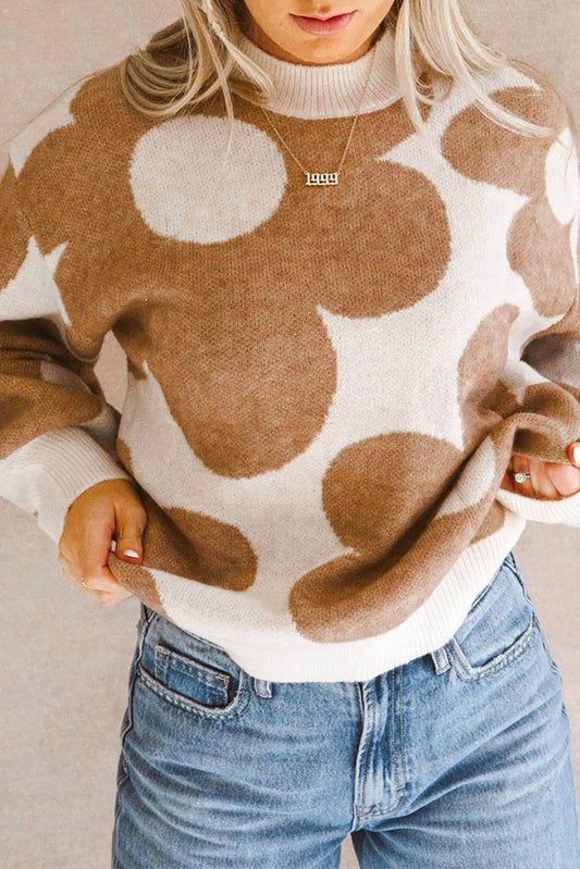 Khaki drop shoulder sweater with big floral pattern from ModestAndDevoted, made of viscose, polyester, and polyamide fibers.