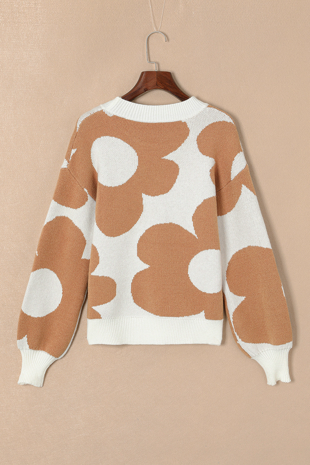 Khaki drop shoulder sweater with large floral pattern from ModestAndDevoted, made of viscose, polyester, and polyamide fibers.
