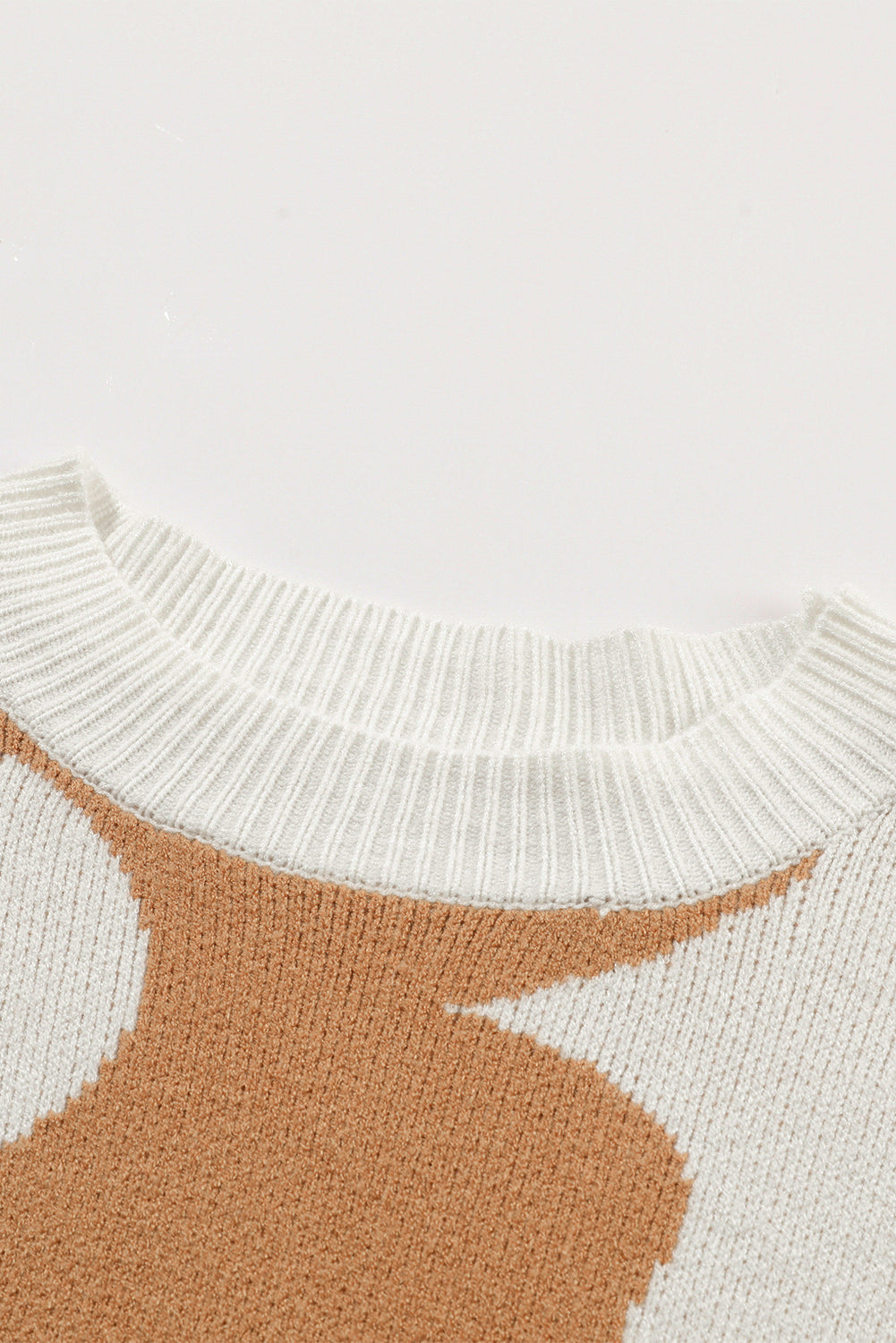 Khaki drop shoulder sweater with large floral pattern from ModestAndDevoted, made of viscose, polyester, and polyamide.