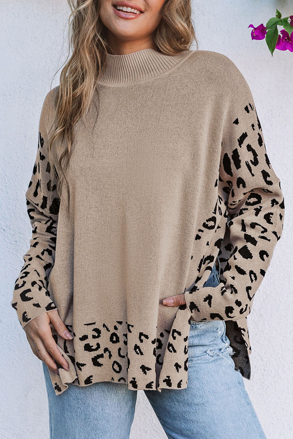 Khaki leopard print oversized sweater with high neck and side slit, made by ModestAndDevoted, featuring a cozy acrylic and cotton blend.